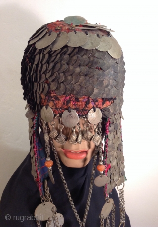 This is a very dramatic headpiece that i believe comes from the Bedouin Nomadic people who lived in the Negev Desert area of Israel. Most of the Bedouin now live in towns.  ...