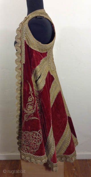 This is a beautiful long sleeveless vest made in either Greece, Turkey or Albania. (The Ottoman Empire) i am not positive although i think It is Turkish. It is made of dark  ...