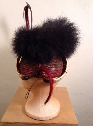 This is a rare headpiece from Nagaland which is a state in Northeast India.  It was used as a ceremonial warrior's hat.  There are four tusks on the headpiece which  ...