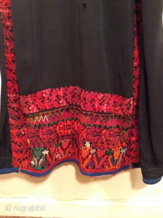 This is a Palestinian dress stemming from the 1930s.  It has been embroidered on the original black fabric and remains in very good condition.  It has been carefully handled in  ...