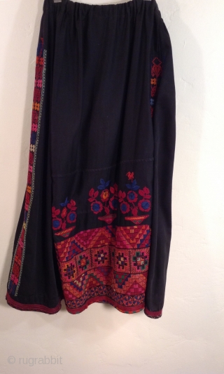 This was originally a Palestinian dress, but was made into a skirt. (Not by me). The top may have been damaged or worn.  The embroidery is beautiful and in perfect condition. 