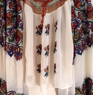 This is a very beautiful and rare Roumanian blouse made between the two Worild Wars in one specific village in Roumania.
The embroidery is extremely tiny and dense with black yarn used to  ...