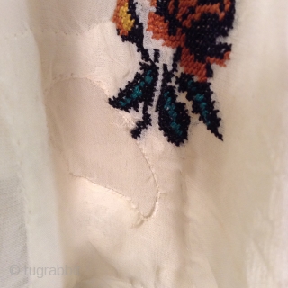 This is a very beautiful and rare Roumanian blouse made between the two Worild Wars in one specific village in Roumania.
The embroidery is extremely tiny and dense with black yarn used to  ...