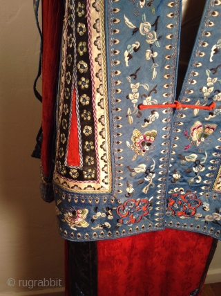 This is a very unusual Chinese suit  mixing a traditional Chinese style pleated and embroidered silk skirt with a more Western style 
jacket..  It was probably custom made for an  ...