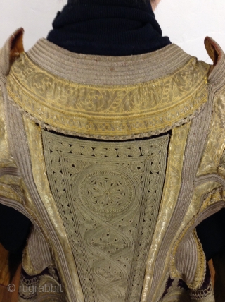 This is a coat from Albania which was part of the Ottoman Empire before the First World War.  The Gold couching work is typical of the Turkish style which was very  ...