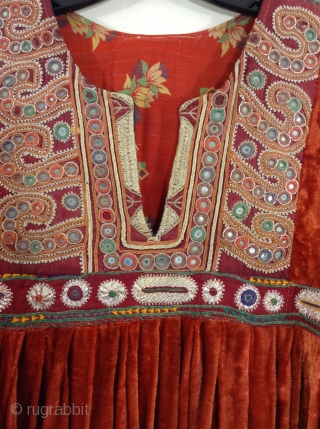 This is a velvet dress from India embroidered with metallic thread.  It is in very fine condition and is wearable. Medium to large size.        