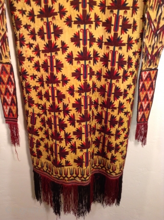 This is a rare Turkmen Chirpy. The yellow color signifies that the lady who wore it was a married woman or simply an older woman.  It is all silk and heavily  ...