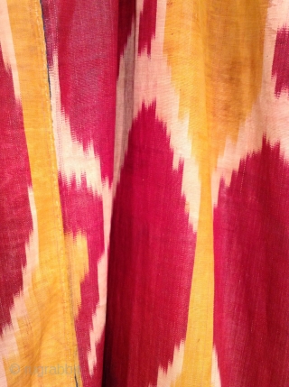 This is an Uzbek ikat silk dress with very traditional colors.  It is in very good condition and would fit a large woman.         