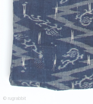 Japanese Kimono, very fine indigo color. I believe the fabric is ramie. It is an Ikat called Katsuri.  

Excellent condition even though it is old.  There is one patch which  ...