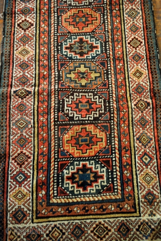 Antique Gendje or Moghan, Caucasus. 420 x 110 Cm. 14 ft.x 3.6 ft.
Collectable rug, around 1850. Memling guls. 

In fair condition. Wear acording to age. 
Some loose wires on the side. 
I  ...