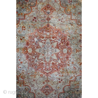 Fine Antique Tabriz Silk Rug, early 20th century. 
Made by a master craftsman. 
Even wear. Refined palette of gray, taupe, celadon-green, red and some soft orange. 
Natural dyes. The orange is made  ...