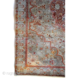 Fine Antique Tabriz Silk Rug, early 20th century. 
Made by a master craftsman. 
Even wear. Refined palette of gray, taupe, celadon-green, red and some soft orange. 
Natural dyes. The orange is made  ...