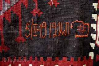 Large Kilim, dated 1919 with Armenian letters,  North Azerbeidzjan, Kuba area. 
A restauration behind the letters. 
Size 203 x 353 Cm's. 
          