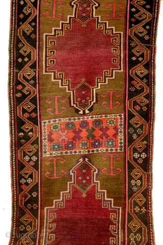 Dagestan, N- Caucasus, 300 x 106 cm. 10 ft. x 3.5 ft. 
Camel field made of camel wool. 
Dragon border. Beautiful abrash. 
Ornament: Banus oiuv means barrel. 
Loved motif of the Kumyken  ...