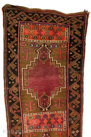 Dagestan, N- Caucasus, 300 x 106 cm. 10 ft. x 3.5 ft. 
Camel field made of camel wool. 
Dragon border. Beautiful abrash. 
Ornament: Banus oiuv means barrel. 
Loved motif of the Kumyken  ...