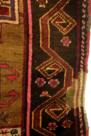 Dagestan, N- Caucasus, 300 x 106 cm. 10 ft. x 3.5 ft. 
Camel field made of camel wool. 
Dragon border. Beautiful abrash. 
Ornament: Banus oiuv means barrel. 
Loved motif of the Kumyken  ...