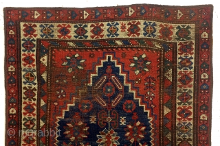 Shirvan, Caucasus, 100 years old,, 186 x 106 cm.
6.2 ft. x 3.5 ft. wool on wool knotted. Natural dye. Low pile, the edges festooned again.        