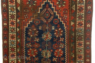 Shirvan, Caucasus, 100 years old,, 186 x 106 cm.
6.2 ft. x 3.5 ft. wool on wool knotted. Natural dye. Low pile, the edges festooned again.        