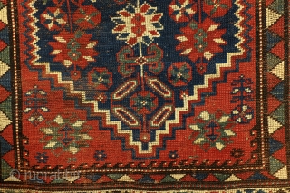 Shirvan, Caucasus, 100 years old,, 186 x 106 cm.
6.2 ft. x 3.5 ft. wool on wool knotted. Natural dye. Low pile, the edges festooned again.        