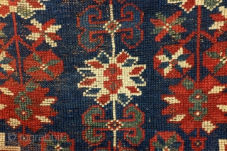 Shirvan, Caucasus, 100 years old,, 186 x 106 cm.
6.2 ft. x 3.5 ft. wool on wool knotted. Natural dye. Low pile, the edges festooned again.        