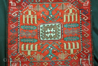 Kazak, Chaili, village in the neighbourhood of the Moghan area. 
Very traditionally in the design.
The red ground is rare. Mostly indigo blue. 
Some light corroding in the black. A few minimal moth  ...