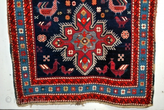 kazak, Karabach, Lampa, 290 x 117 Cm. Dated - 1308 = 1891. Beautiful cochenille red. Great high pile - 1 cm.  The wool looks splendid, the only mark of it's old  ...
