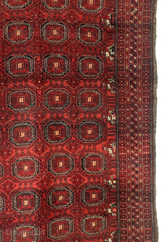 Turkoman Ersari Tekke. 
Saryken 'Mary' Gul, late 19th century, even wear, nice pile. 
Abrash in the cherry red field. 
256 x 137 Cm. 8.5 ft. x 4.5 ft. 
    