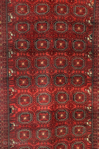 Turkoman Ersari Tekke. 
Saryken 'Mary' Gul, late 19th century, even wear, nice pile. 
Abrash in the cherry red field. 
256 x 137 Cm. 8.5 ft. x 4.5 ft. 
    