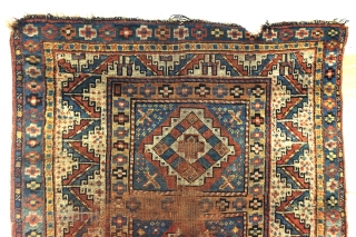 Karabach, 1900 - 1915, beautifully worn rug. 190 x 101 Cm. 
Border with Zoroast symbols, fire and fire torch. 
             