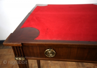 18th century playfull gaming table. 
Louis XVI, 1780 1795. 
Mahogany. 
All original. 
As a side table 35 Cm deep and 73 wide. 
Opened to play 70 x 73 Cm. High 77 Cm.  ...