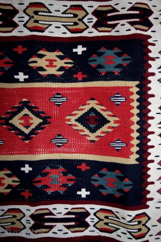 sarkoy kilim, Tracian, Greek/Macedonian area. Late 19th begin 20th century. 
The right red. No bleeding. The headings were folded and a fabrick was stitched around.
Ugly, I took it away. Headings still folded,  ...