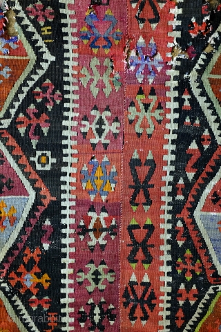 Kilim, Anatolia, fragment, as is, sewn on a protecting cloth at the back. 
280 x 167 Cm. old repairs.              