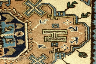 Kazak, Konaghend, Shirvan area, 125 x 225 Cm. Ivory ground, possibly a dowry gift. 
1920 - 1930. Rarely seen pattern on knotted carpets - mostly on soumacks. 
     