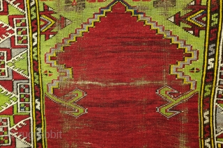 Karapinar, Anatolia, 19th century, 140 x 93 Cm.  

As found, not restored or washed. Headings have wear, kilim endings are worn off. 

Great green color. Warp white wool. The sides are  ...