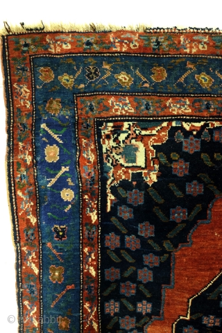4.3 ft x 6.8 ft   205 cm x 130 cm. 
Wool on cotton.
Around 1920.

Overall in good condition, some old repairs in the orange-red 'open field'. . 3th photo. And wear  ...