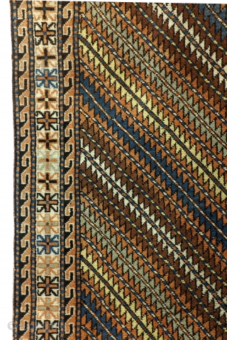 Gendje, Caucasus. 
207 x 110 Cm. 7 ft. x 3.6 ft. 
Wool on wool. 
Warp thick brownish wool. 

Typical pattern for Gendje. 
Old colors, full pile. Gool condition. 
Running dog borders flanking  ...