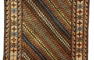 Gendje, Caucasus. 
207 x 110 Cm. 7 ft. x 3.6 ft. 
Wool on wool. 
Warp thick brownish wool. 

Typical pattern for Gendje. 
Old colors, full pile. Gool condition. 
Running dog borders flanking  ...