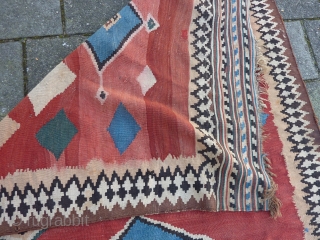 Funky Qashqai Kilim, 230 x 157/150 cms., with some minor repairs. All natural dyes and also a stroke of 30 cms. with probably a synth. pink one: only there some color run  ...