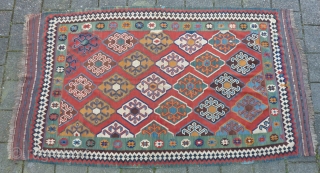 Qashqai Kilim, 278 x 160 cms., ca. 1900. Very clothlike and pliable. With two small damages and a few scattered minor repairs. Natural dyes.         