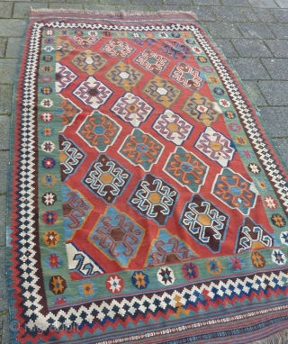 Qashqai Kilim, 278 x 160 cms., ca. 1900. Very clothlike and pliable. With two small damages and a few scattered minor repairs. Natural dyes.         