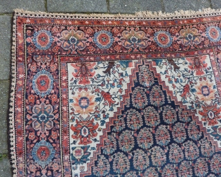 Senneh rug, 191 x 130 cms., ca. 1900. Very good condition and pile, without any wear. No repairs done. Endings complete and secured. Natural dyes and a faded hot red.   