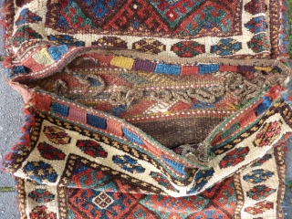 Antique Jaff Kurdish double bag, 112 x 63 cm.,end 19th c., good pile all over, some small repairs done, all natural dyes including a nice aubergine. Washed.      