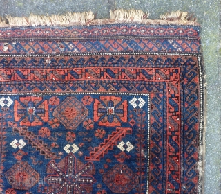 Baluch mina khani Bagface 19th. c., 81  x 74 cm., 32" x 29". With reasonable pile, a few silk knots and four finger thick seize holes. At the bottom kilim ending  ...
