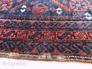 Baluch mina khani Bagface 19th. c., 81  x 74 cm., 32" x 29". With reasonable pile, a few silk knots and four finger thick seize holes. At the bottom kilim ending  ...