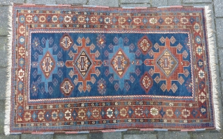 Caucasian Shirvan ca. 1900, 184  x 117 cm., 6' x 3'10". Knotted on woolen ground and with all natural dyes. With lower browns and some wear in two places ( see  ...