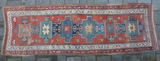 Antique NW-Persian/ Caucasian runner, 312  x 105 cm., 10'3" x 3'5" on woolen ground. With some wear and with all natural dyes. One older repair ( see pict. 3). Washed.  