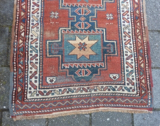 Antique NW-Persian/ Caucasian runner, 312  x 105 cm., 10'3" x 3'5" on woolen ground. With some wear and with all natural dyes. One older repair ( see pict. 3). Washed.  