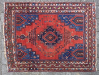 Afshar rug, ca. 1920, 211  x 161 cm., 6'11" x 5'3". In general good pile with original sides and endings. Corroded browns, a bit of lower pile at the central part  ...