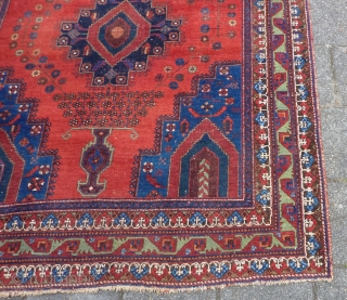 Afshar rug, ca. 1920, 211  x 161 cm., 6'11" x 5'3". In general good pile with original sides and endings. Corroded browns, a bit of lower pile at the central part  ...