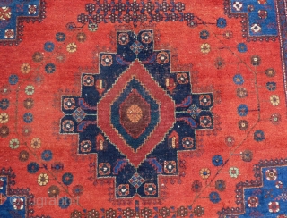 Afshar rug, ca. 1920, 211  x 161 cm., 6'11" x 5'3". In general good pile with original sides and endings. Corroded browns, a bit of lower pile at the central part  ...